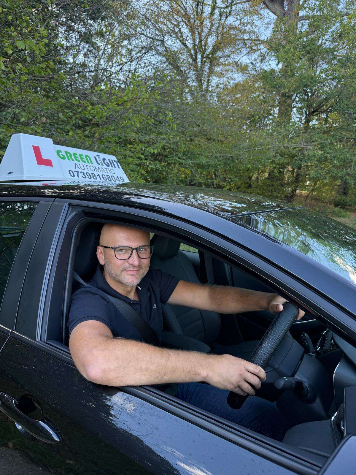 Simon in the Green Light automatic driving school car